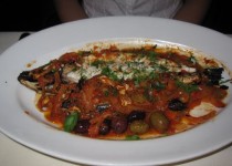 Sea bass with olives, tomatoes, and fennel