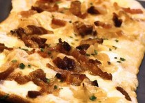 Tarte Flambée with Caramelized Onions, Smoked Bacon, and Creamy Cheese